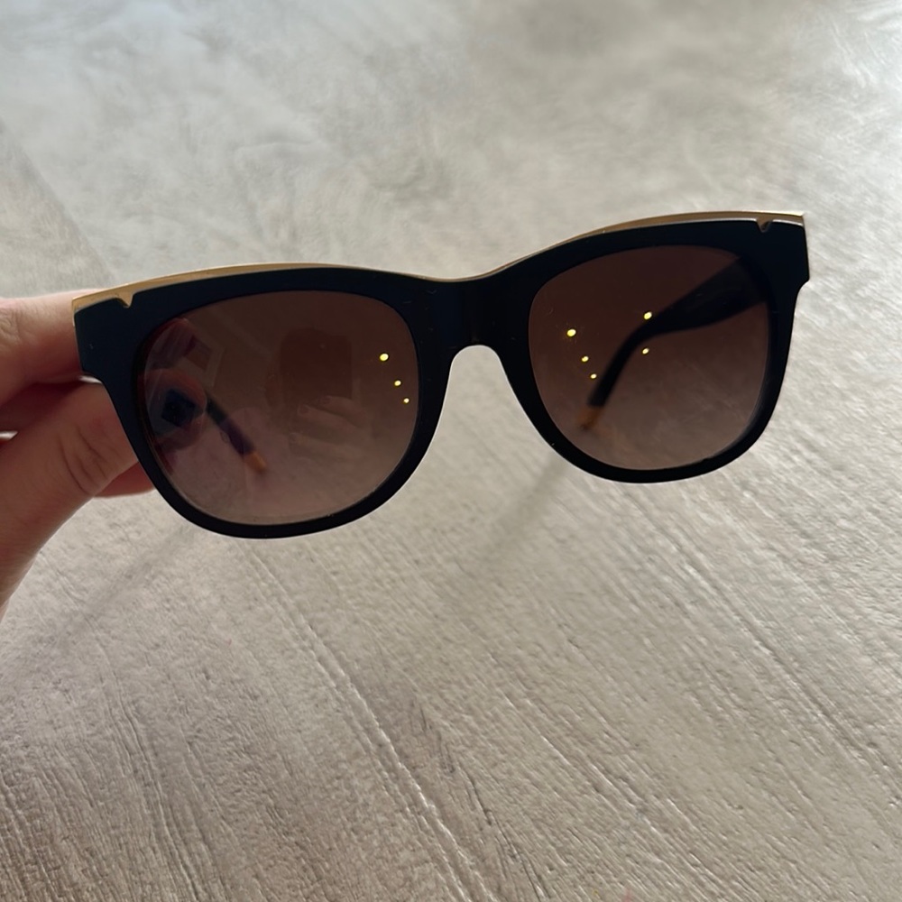 Black and gold Tory Burch sunglasses